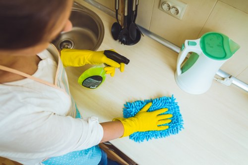 House clearance team handling furniture removal in an Ealing home